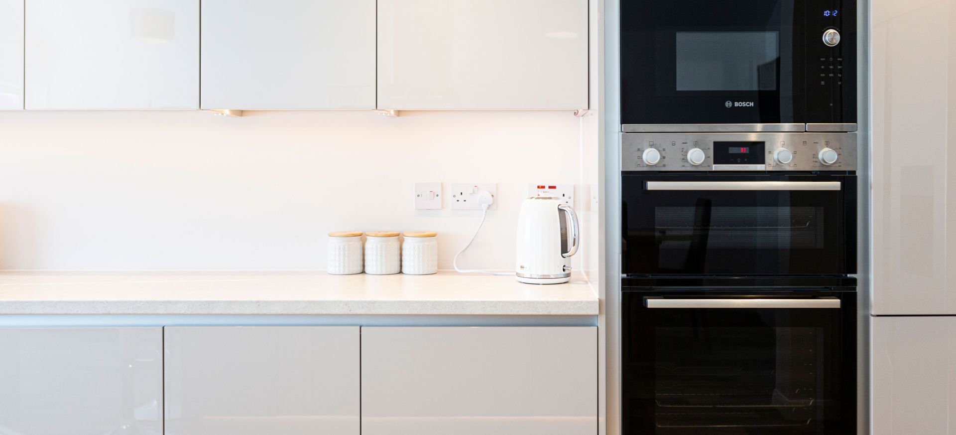 Seamlessly integrated Bosch and Neff appliances.